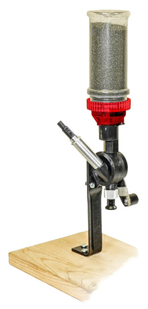 Lee Perfect Powder Measure in red and black with steel stand