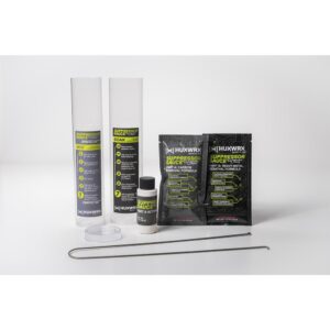 HUXWRX Suppressor Sauce Cleaning Kit components: mix bottle, soak bottle, powder packets, activator bottle, and extraction wi
