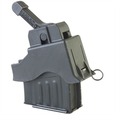 Black polymer Maglula AK-47 mag loader clipped onto a 7.62x39 magazine