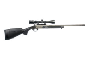Traditions Outfitter G3 Pro .35 Whelen single shot rifle with black synthetic stock, fluted barrel, muzzle brake, and mounted 3-9x40 scope
